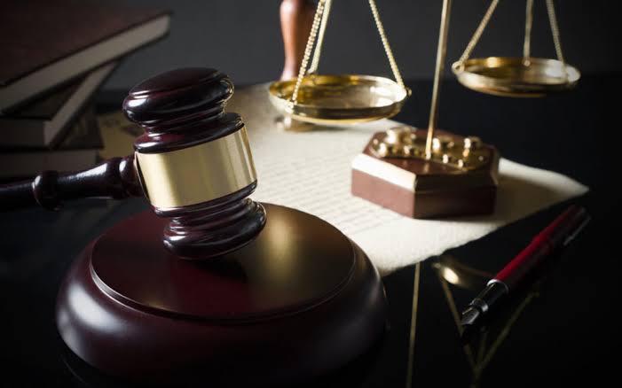 A judge’s gavel and scales of justice